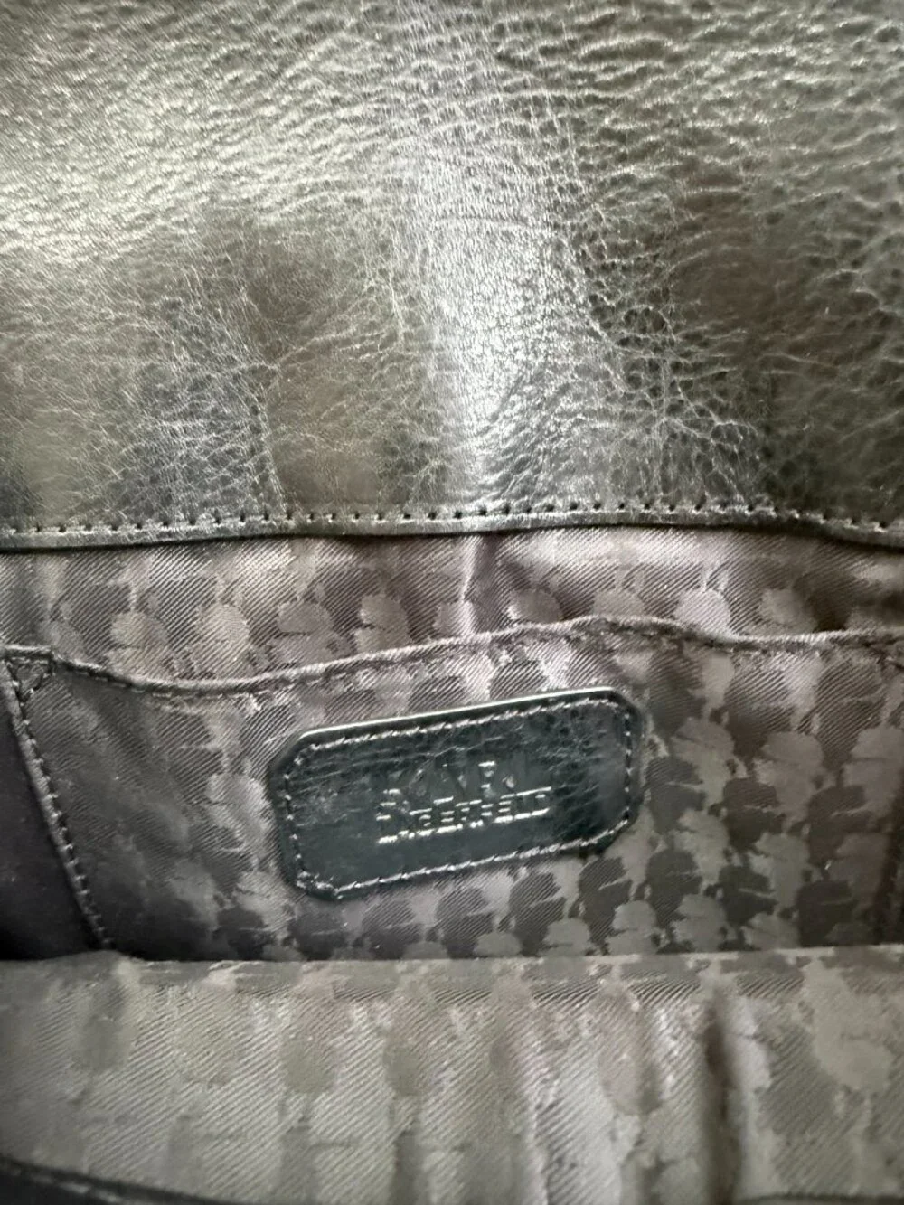 Karl Lagerfeld black crossbody bag crafted from genuine leather and natural sued